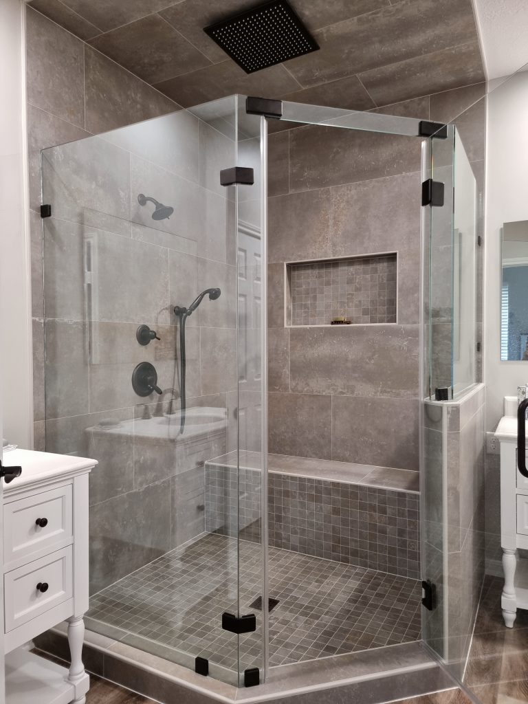 master bathroom remodel grey tile with glass shower