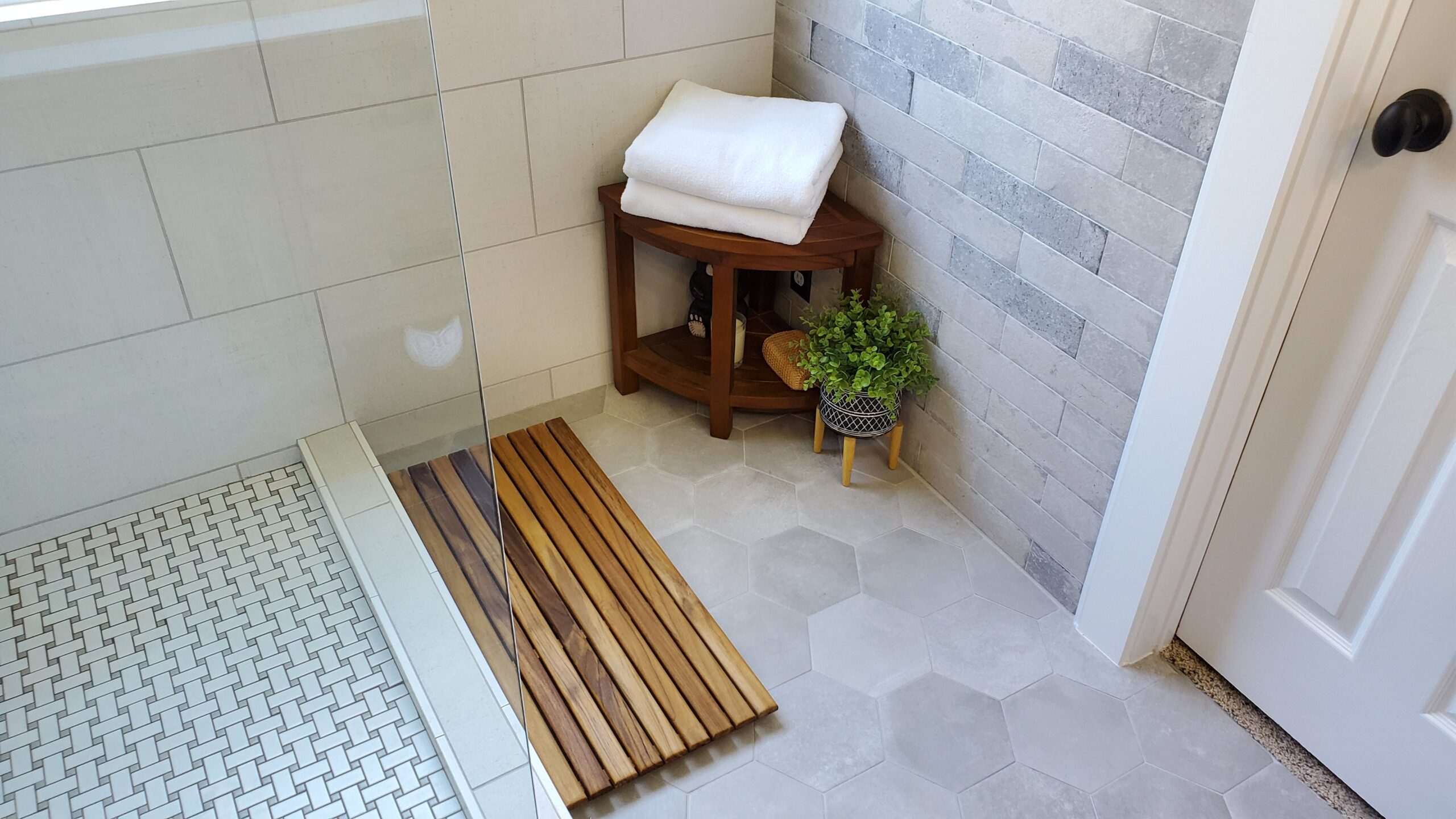 This is a dry-off area of a large tub-to-shower conversion we built in 2019.
