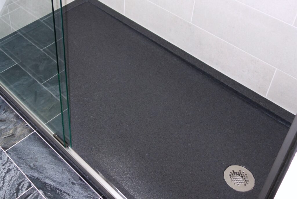 Onyx Custom Solid Surface Shower Base In Black