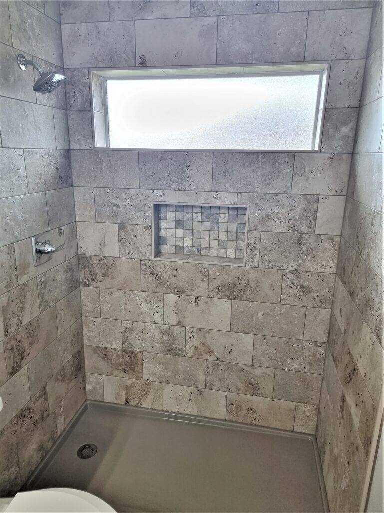 Shower Remodel With Tile Walls and Solid Surface Base- Richmond, TX