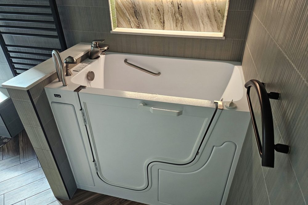 This is a an acrylic walk-in tub from SanSpa installed by Simplicity Bath for a retired couple looking for a safer bathing solution in Fulshear, TX.